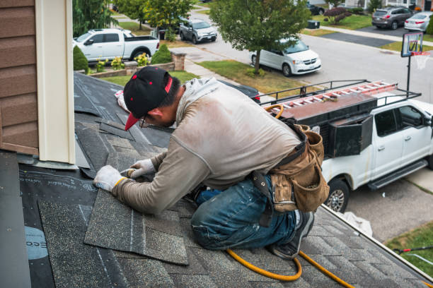 Professional Roofing technician working in Interlaken, NY